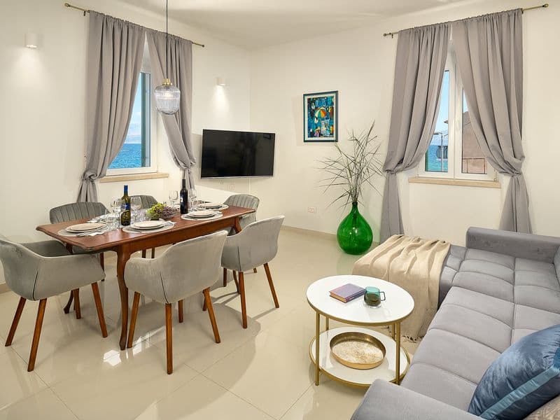 Contemporary living room interior with dining table,luxury holiday apartment Croatia