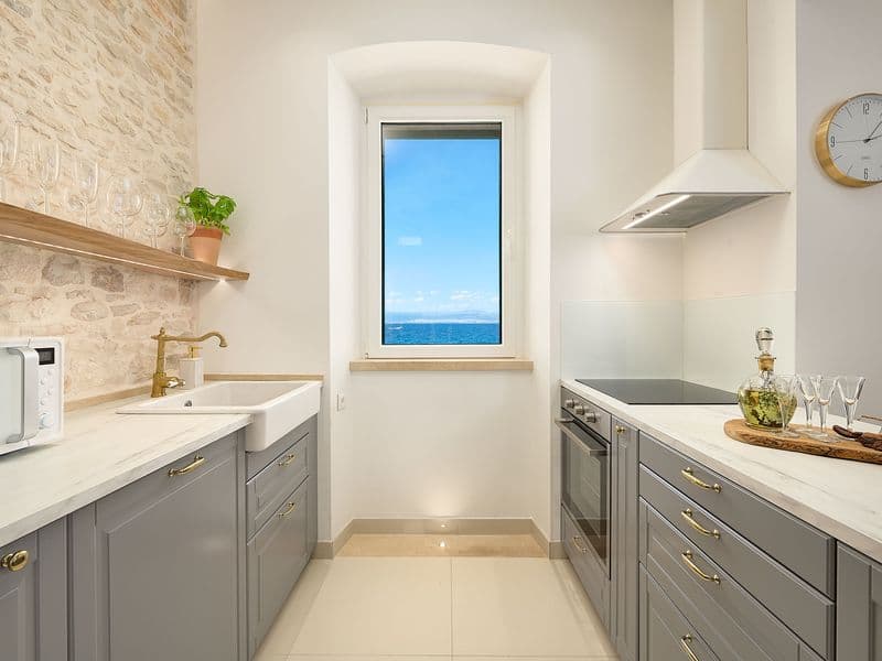Contemporary apartment kitchen, fully equipped with stunning sea views, holiday rental Croatia